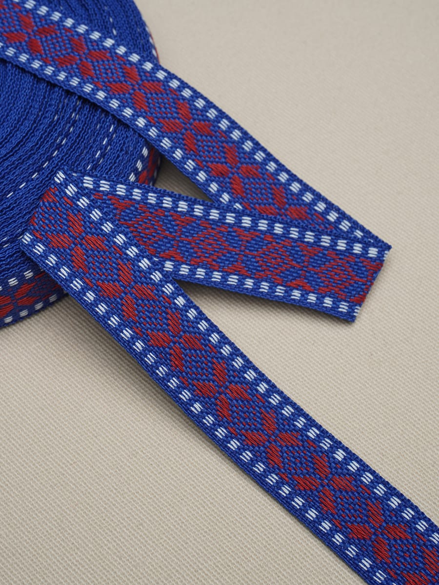 Жак.лента 24мм Орнамент-красная звезда на синем