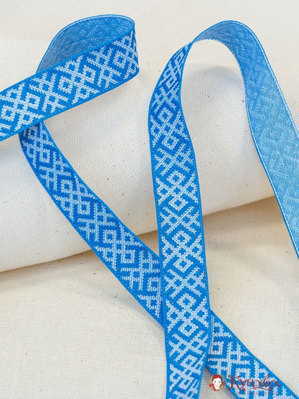 Жак.лента 23мм Белая вышивка на голубом