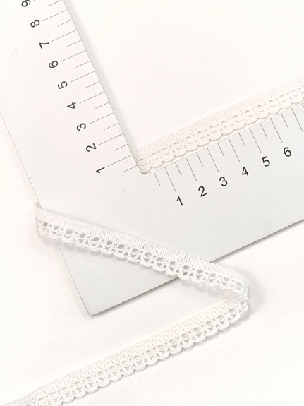 Кружево цв.белый, ш.12мм, хлопок-90%, п/э-10%.