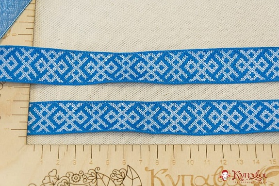 Жак.лента 23мм Белая вышивка на голубом