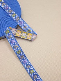 Жак.лента 18мм Белый/св.розово-желтый орнамент-снежинка на т.небесно-лазурном