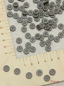 Пуговица пластмасса, цв.графит, 8мм, 4 отверстия